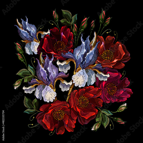 Blue irises and red roses flowers. Embroidery art. Summer floral garden background. Fashion template for clothes, t-shirt design