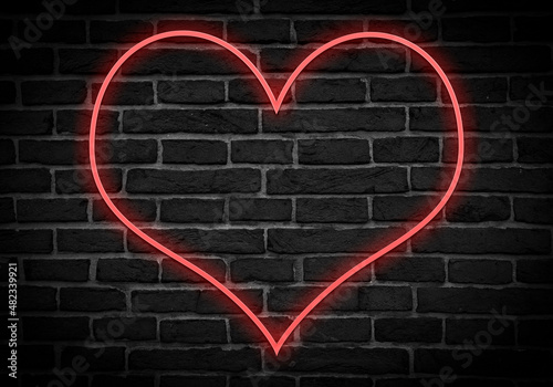 Quadro su tela Icono de corazón rojo en neón sobre ladrillos.