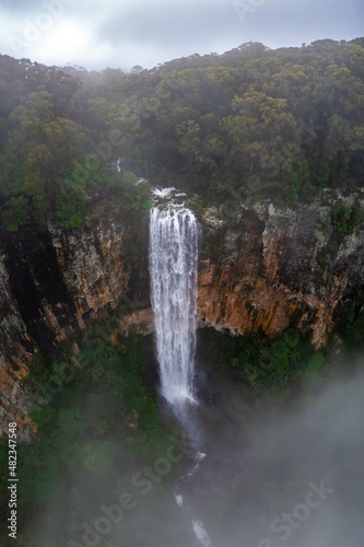 Aerial photo of the beautiful Purling Brook Falls on a misty morning