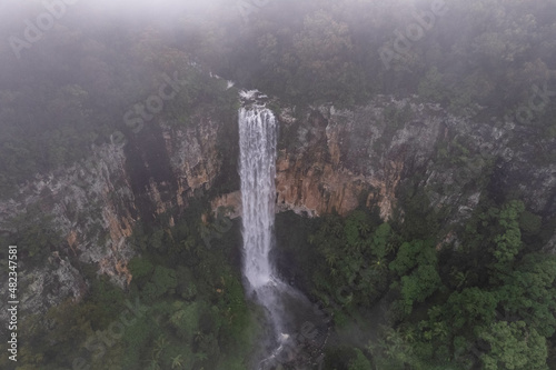 Aerial photo of the beautiful Purling Brook Falls on a misty morning
