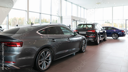 car dealership interior Premium cars lined up © Ivan Traimak