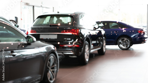 dealership selling premium SUVs, blurred photo with depth of field for background