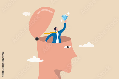 Fototapeta Self discovery, finding yourself searching for self value, success dream or meaning of life, exploration, inner or inside concept, happy businessman succeed finding valuable diamond inside his head