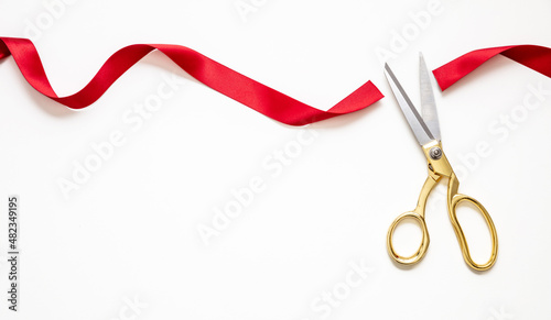Inaugural invitation, ribbon cut, Grand opening, New business. Gold scissors isolated on white