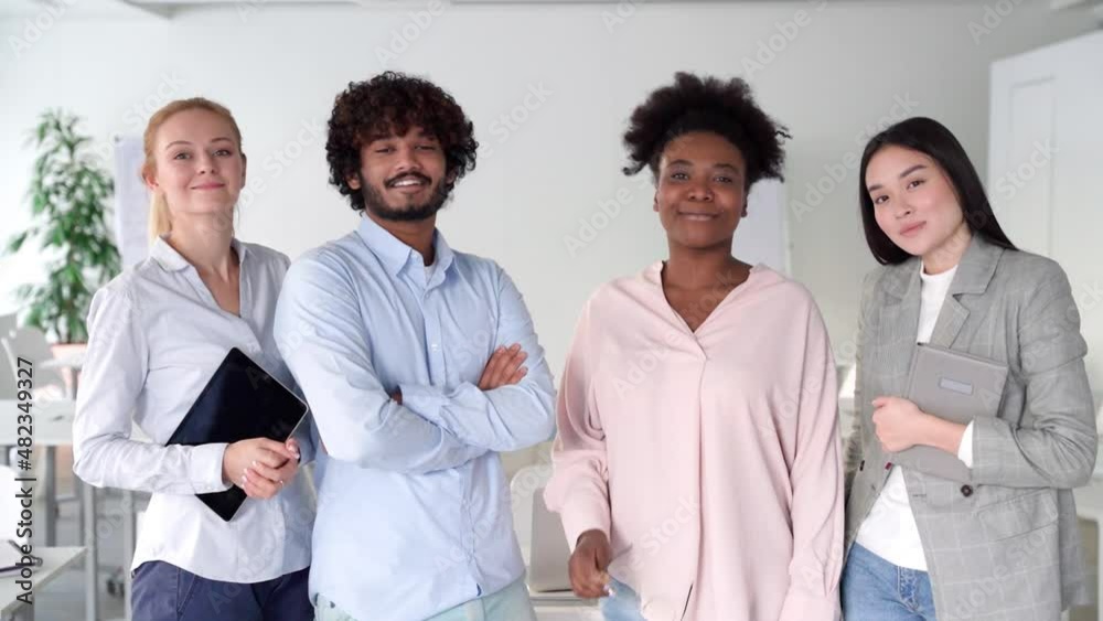 Diverse interracial business team, people diverse group looking at camera Diverse interracial business team, people diverse group looking at camera