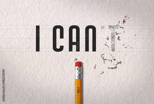 Positive thinking concept transforming the word “i can't” to the word “i can” with pencil eraser on white paper photo