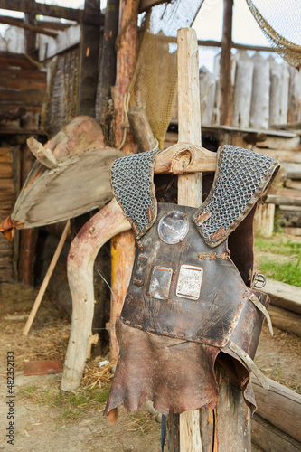 Clothing and armor of a medieval knight. Body protection made of metal and leather. Viking or Celtic
