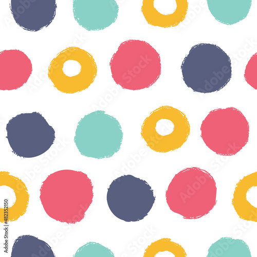 Seamless vector background with polka dots. The pattern is great for baby clothes, fabrics, prints, wallpapers and other surfaces.