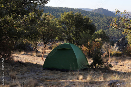 camping tent among the trees