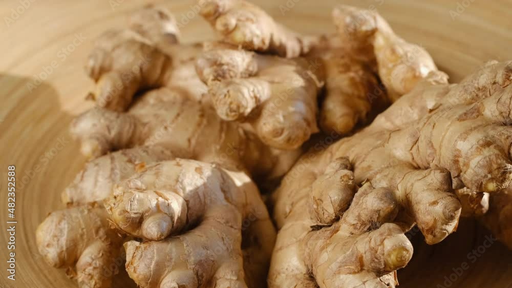 Whole ginger root on close up rotating 4K Whole ginger root on close up rotating 4K