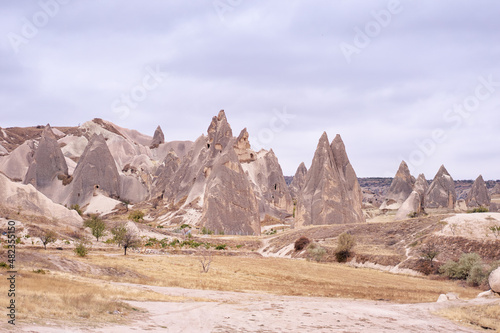 Travel and tourism in Turkey. Famous sightseeing Cappadocia, Anatolia. Beautiful landscape with mountains, hills and caves.