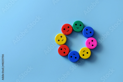 A group of colorful circles with smiles. A symbol of teamwork or friendship between different people