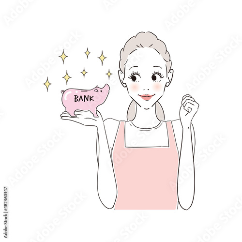 貯金がたまってガッツポーズの主婦