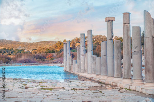 Patara ancient city columns with cloudy sky photo