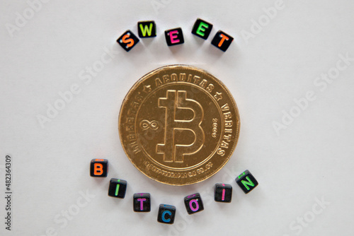 sweet chocolate bitcoin on white background