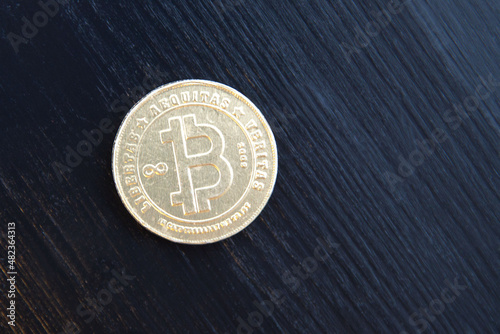 sweet chocolate bitcoin on black background
