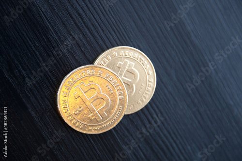 sweet chocolate bitcoin on black background