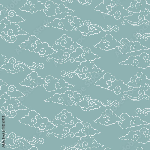 Vector celestial seamless pattern with oriental clouds. Pastel hand drawn cozy textile or magic wrapping design