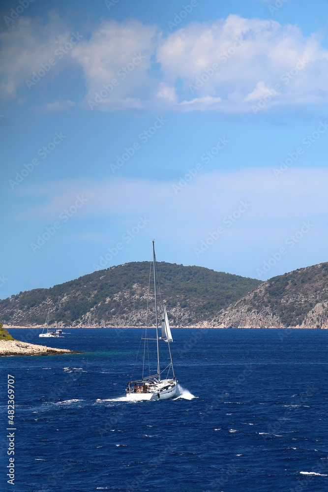 Sailing boat and beautiful Adriatic sea landscape in Croatia. Sailing boat and beautiful Adriatic sea landscape in Croatia.