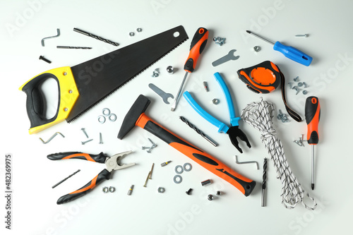 Work tools on white background, top view