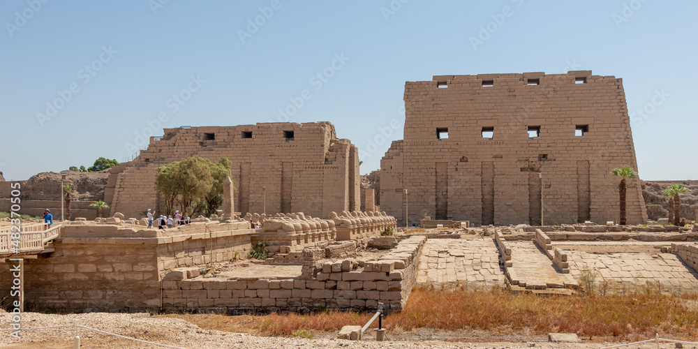 Luxor, Egypt - September 21, 2021: Anscient Temple of Karnak in Luxor - Ruined Thebes Egypt. Walls and Sphinxes at Karnak Temple.