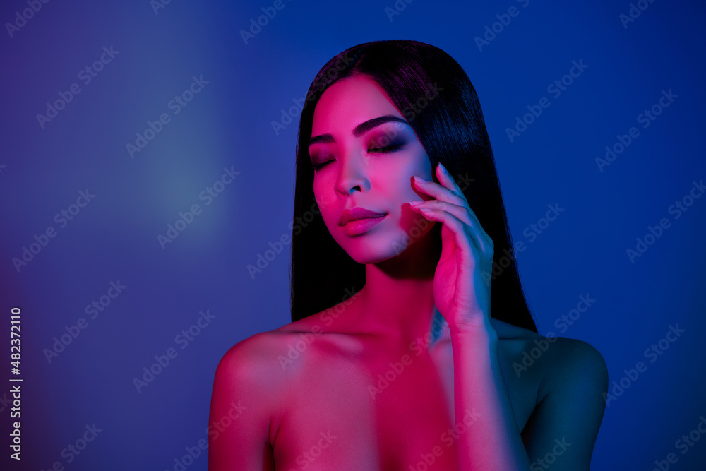 Photo of stunning pretty lady touch hand face enjoy soft skin cheeks isolated vivid shine color background Photo of stunning pretty lady touch hand face enjoy soft skin cheeks isolated vivid shine color background