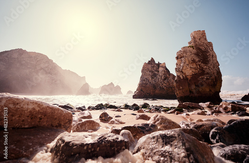 Atlantic ocean beach on the rock coast. Portugal. © luengo_ua
