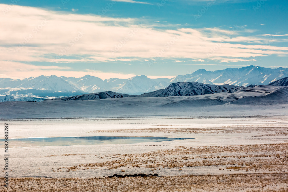 Tian Shan Mountains. Tuzkol lake of Kazakhstan. Winter mountains landscape Tian Shan Mountains. Tuzkol lake of Kazakhstan. Winter mountains landscape
