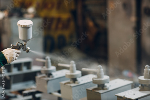 Foto Powder primer coating of metal parts