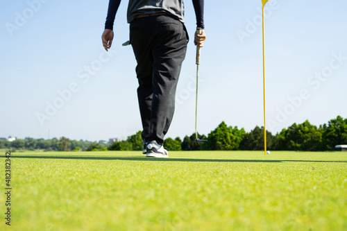 Golf sport played on the outdoor courts of the social elite.
