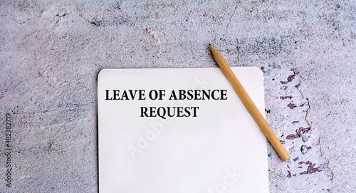 Leave of absence request and wooden pencil 