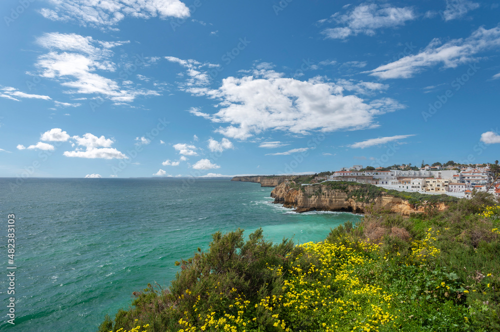 Townscape of Carvoeiro in the Algarve and rocky coastline
