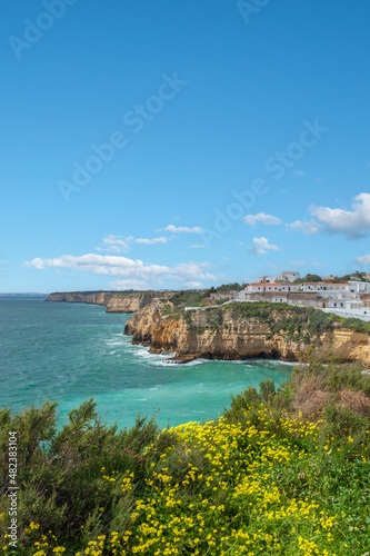 Townscape of Carvoeiro in the Algarve and rocky coastline