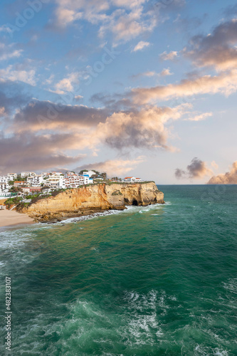 Townscape of Carvoeiro in the Algarve and rocky coastline