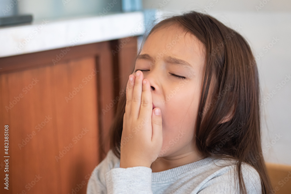 Tired and sleepy young little girl yawing Tired and sleepy young little girl yawing