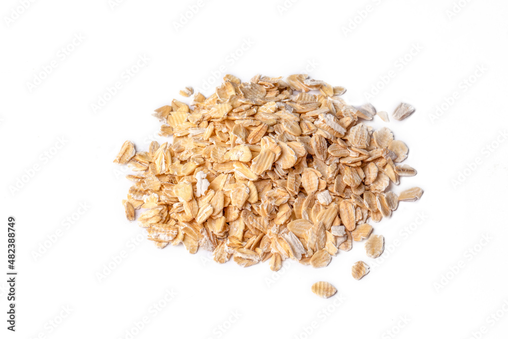 Heap of dry rolled oats isolated Heap of dry rolled oats isolated