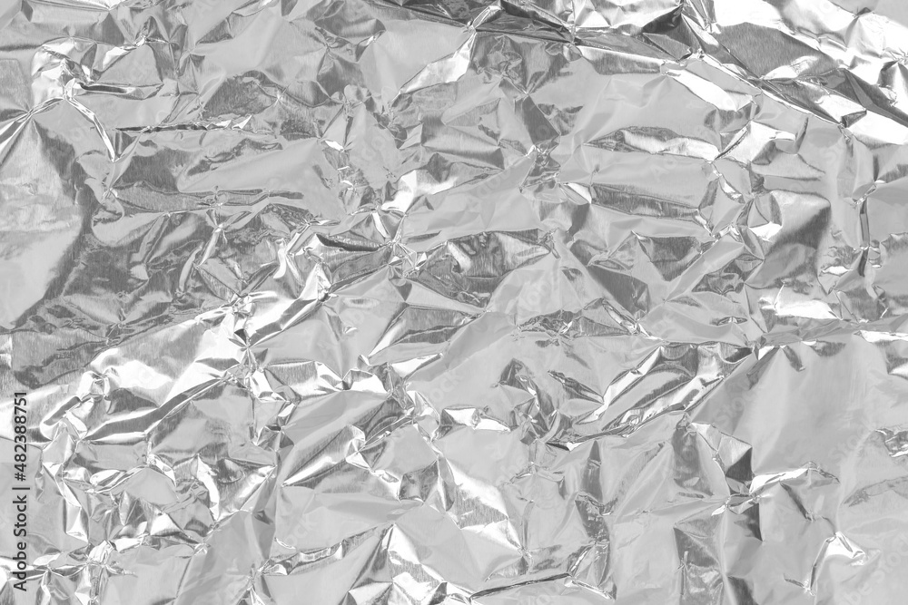 Silver foil leaf shiny texture, abstract grey wrapping paper for background and design art work. Silver foil leaf shiny texture, abstract grey wrapping paper for background and design art work.