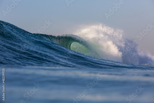 Fototapeta Naklejka Na Ścianę i Meble -  huge crashing wave on the beach
