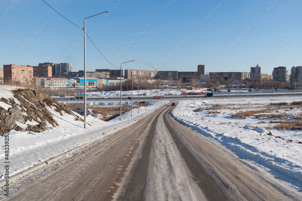 Views of the city of Ust-Kamenogorsk (kazakhstan) City outskirts. New residential area. Winter snow cityscape. Architecture old and new