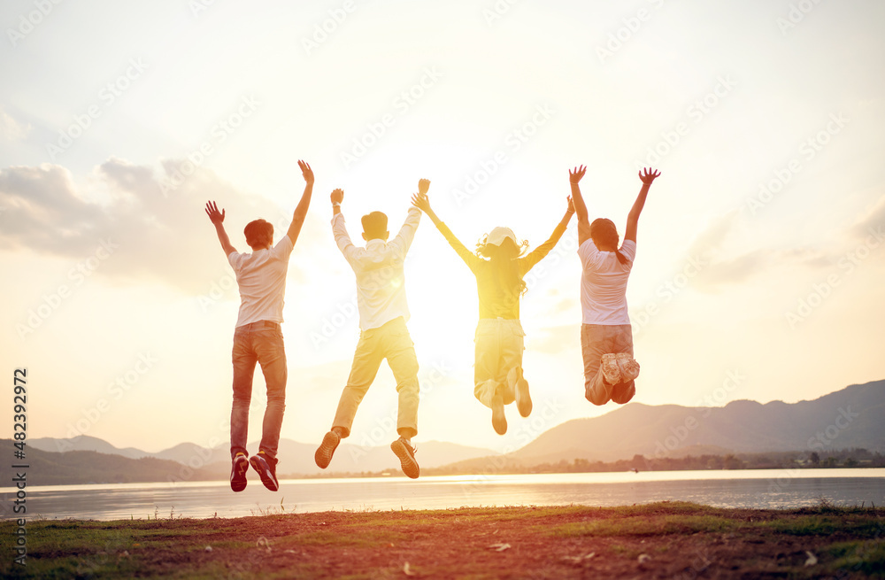 A group of Asian friends backpacker and walking for picnic and camping and and Raise your hand cheerful excitement A group of Asian friends backpacker and walking for picnic and camping and and Raise your hand cheerful excitement