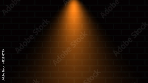 Empty brick wall with orange neon light with copy space. Lighting effect orange color glow on brick wall background. Royalty high-quality free stock photo image of blank, empty background for design