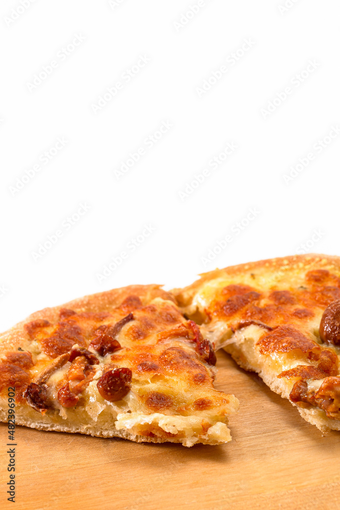 Extreme Closeup View of Sliced Traditional Freshly Baked Cheese and Mushrooms Pizza On Woden Plate. Food Concepts. Extreme Closeup View of Sliced Traditional Freshly Baked Cheese and Mushrooms Pizza On Woden Plate. Food Concepts.