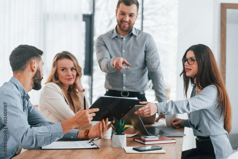 Modern office. Group of business people that working on the project Modern office. Group of business people that working on the project