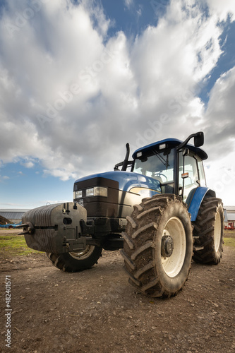 Big blue modern tractor.