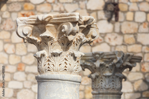 Decorative details of an ancient Ionic column.