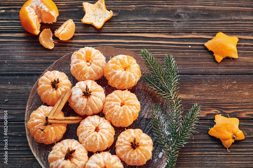 Fototapeta Naklejka Na Ścianę i Meble -  Many of the oranges. Christmas background with holiday decoration