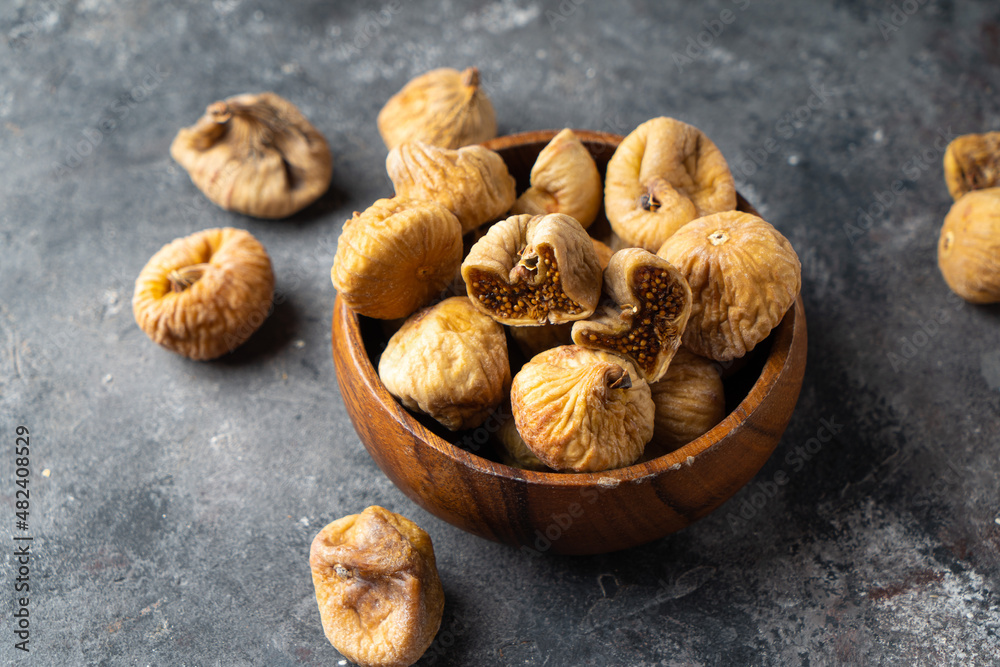 Delicious dried figs in a bowl. Healthy food Delicious dried figs in a bowl. Healthy food