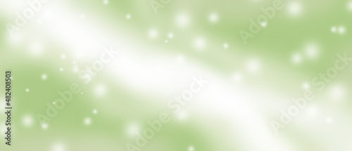 Abstract white glow on green background
