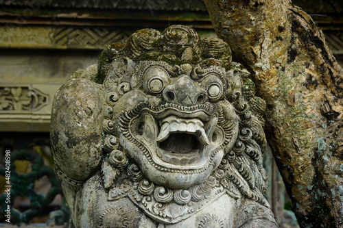 Close up view of the ornate statue  guard statue  at Ubud Palace  Bali.