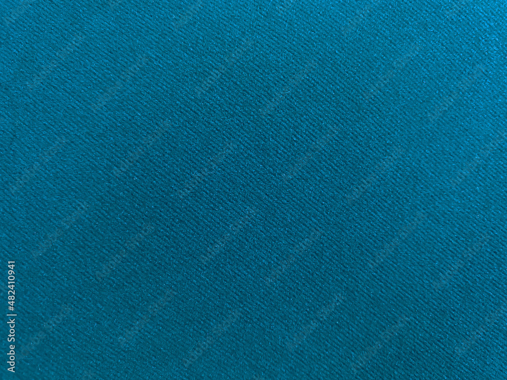 Light blue velvet fabric texture used as background. Empty blue fabric background of soft and smooth textile material. There is space for text..